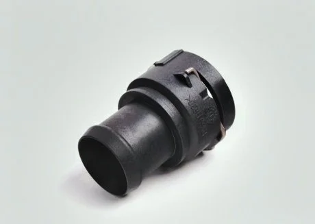 Колiно з\'єднання патрубкiв VAG 7M3122291